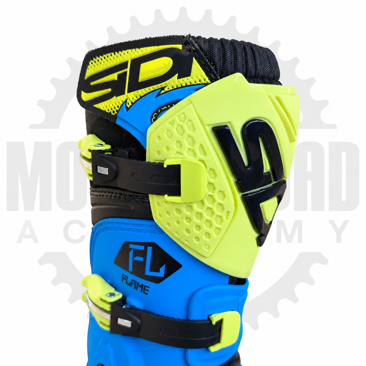 Protección frontal de espinilla y hebillas de las botas SIDI Flame infantiles azules y amarillo lima.